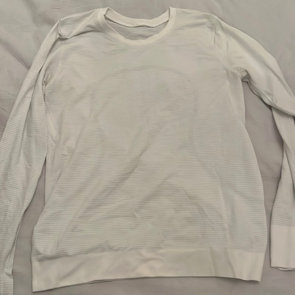 White Lululemon relaxed swiftly long sleeve top. No flaws!!